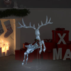 A white LED flying reindeer Christmas decoration with a red bow stands indoors.