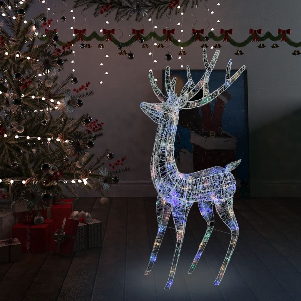 6ft acrylic Christmas reindeer with 250 colorful LEDs, standing beside a decorated tree.