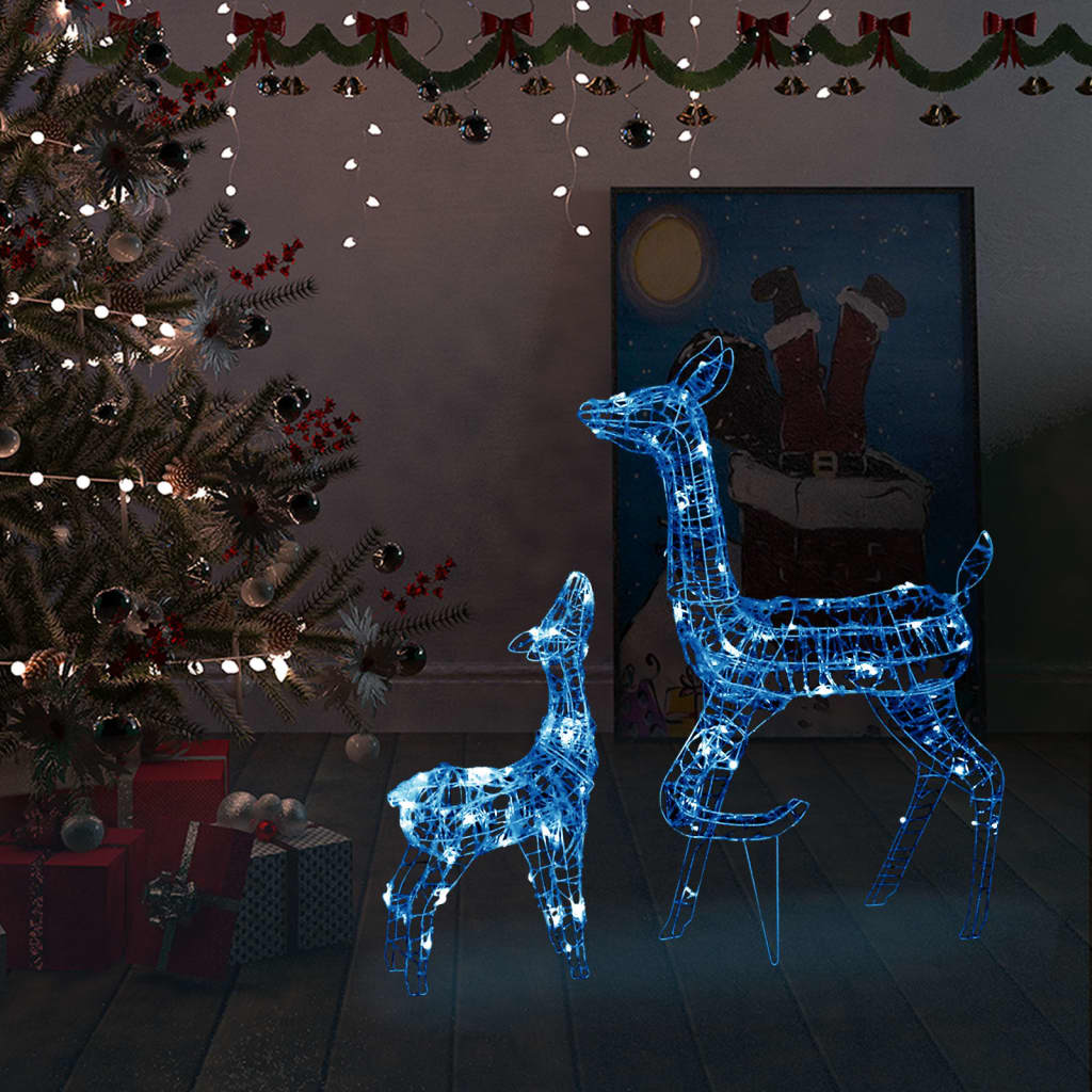 Two acrylic reindeer with 160 blue LED lights in a family Christmas decoration set.