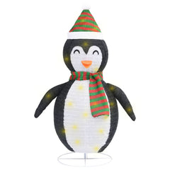 Black and white 4ft LED snow penguin figure with red and green striped hat and scarf