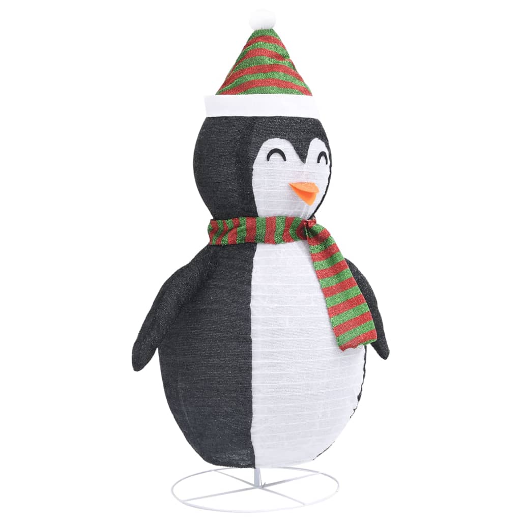 4ft black and white LED snow penguin figure with green striped hat and scarf on a stand.