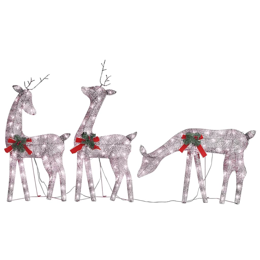 Three lighted reindeer decorations with red bows and green accents.