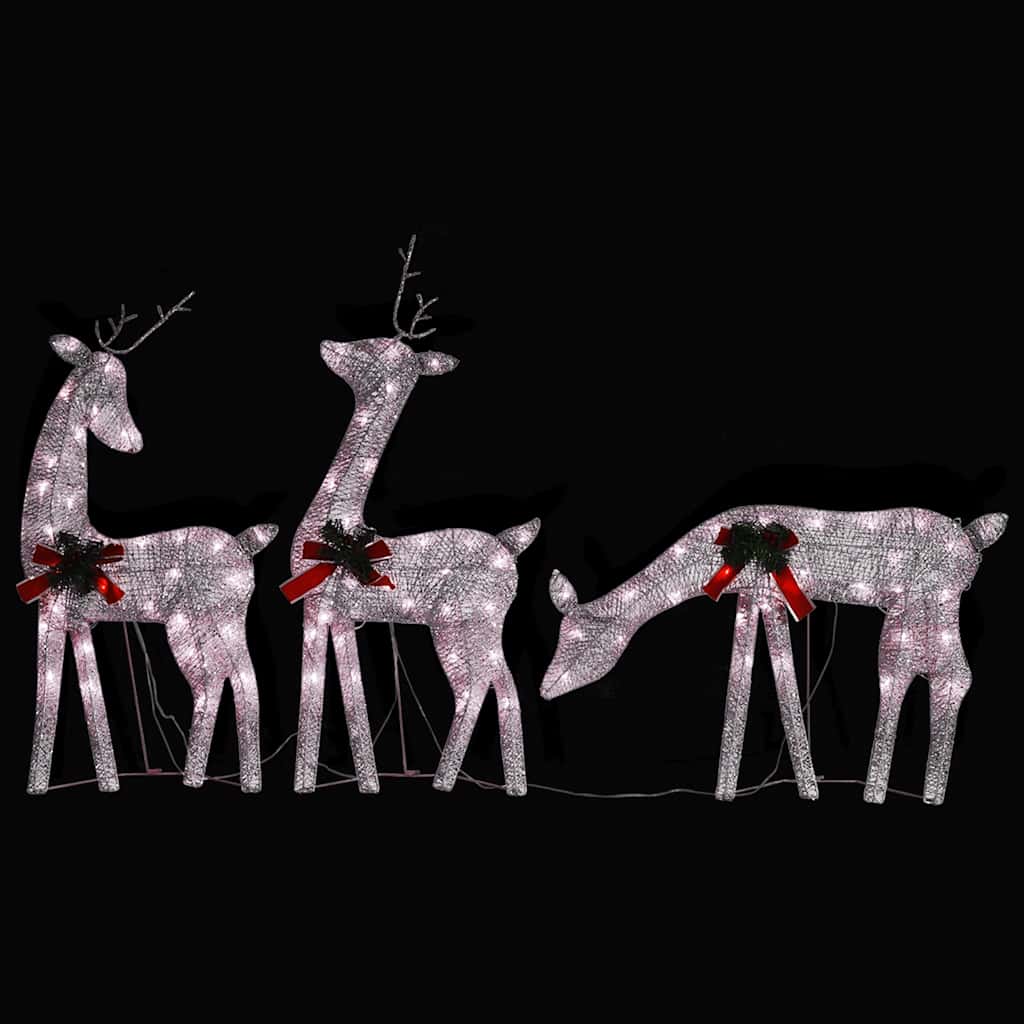 Three golden lighted reindeer with red bows and warm white LEDs on a black background.