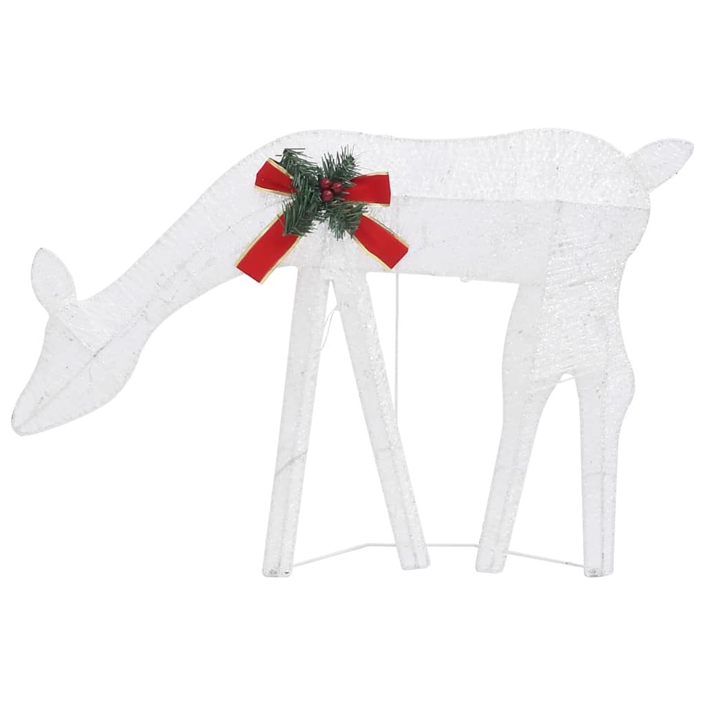 A family of three reindeer illuminated with cold white LED lights for outdoor holiday decor.