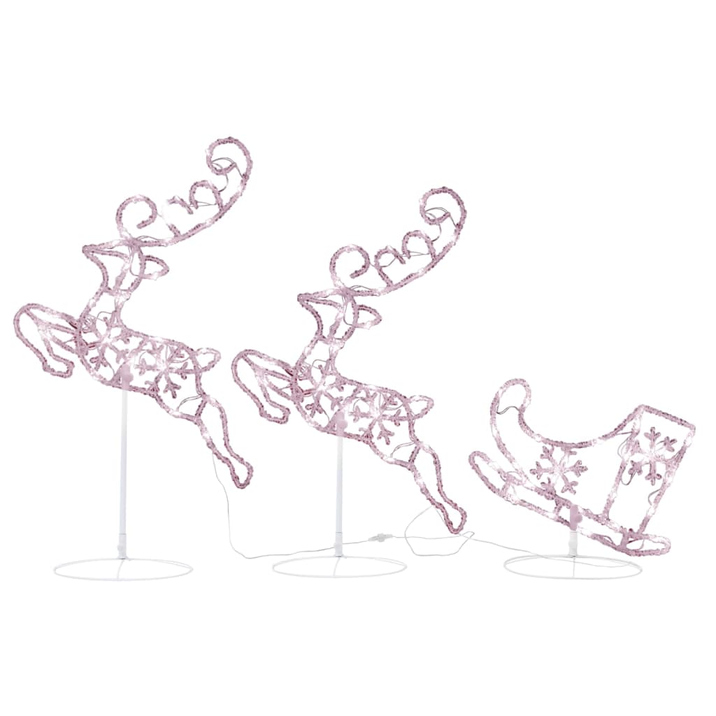Acrylic flying reindeer and sleigh with warm white LED lights on stands.
