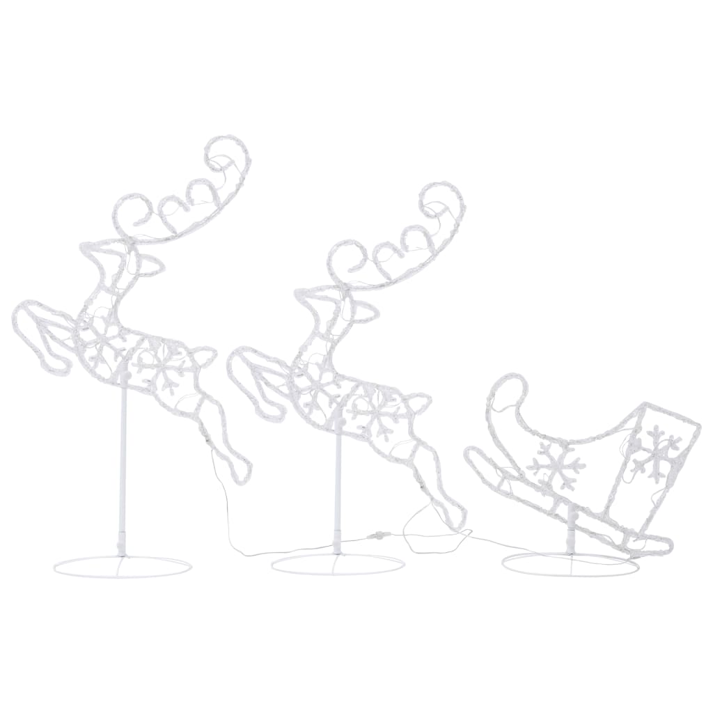 Acrylic flying reindeer and sleigh with warm white LED lights on stands.
