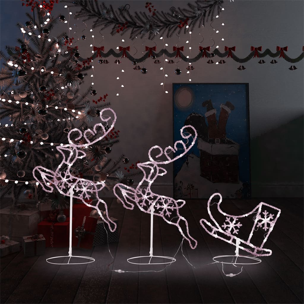 Acrylic flying reindeer and sleigh with warm white LED lights on stands.