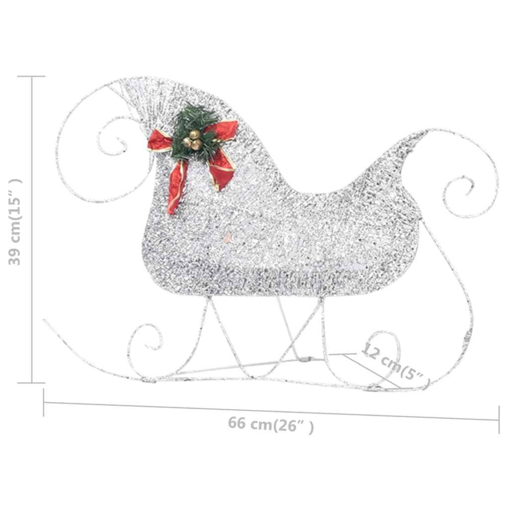 A silver glitter Christmas sleigh decoration with a red bow and green holly, measuring 66x39 cm.