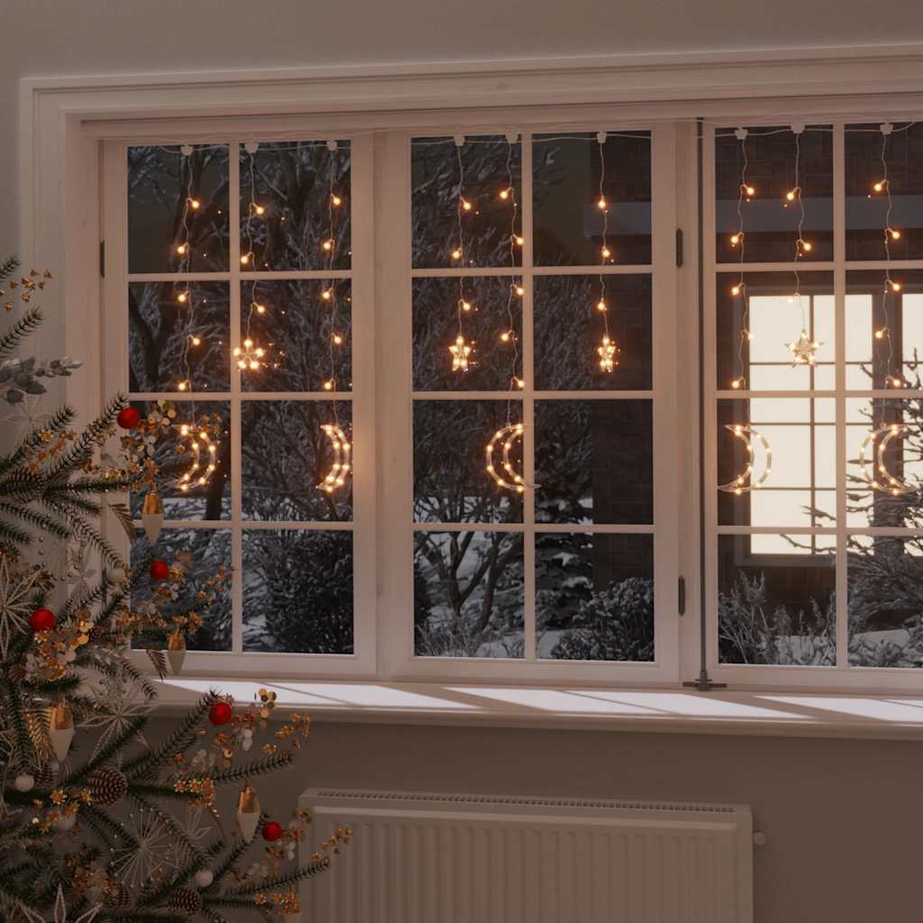 Bostome 138 LED warm white star and moon fairy lights with remote, shown hanging in a window.