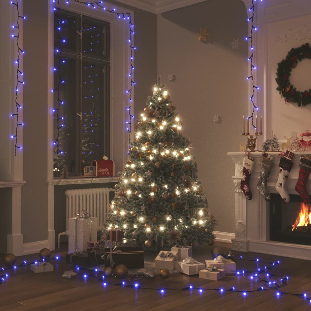 Blue LED string lights draped around a cozy living room with Christmas tree and fireplace.