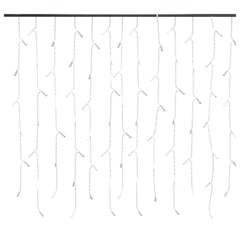 A curtain of white icicle lights hangs from a dark bar.
