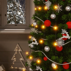 Two strands of warm white solar fairy lights with 400 LEDs draped on a Christmas tree.