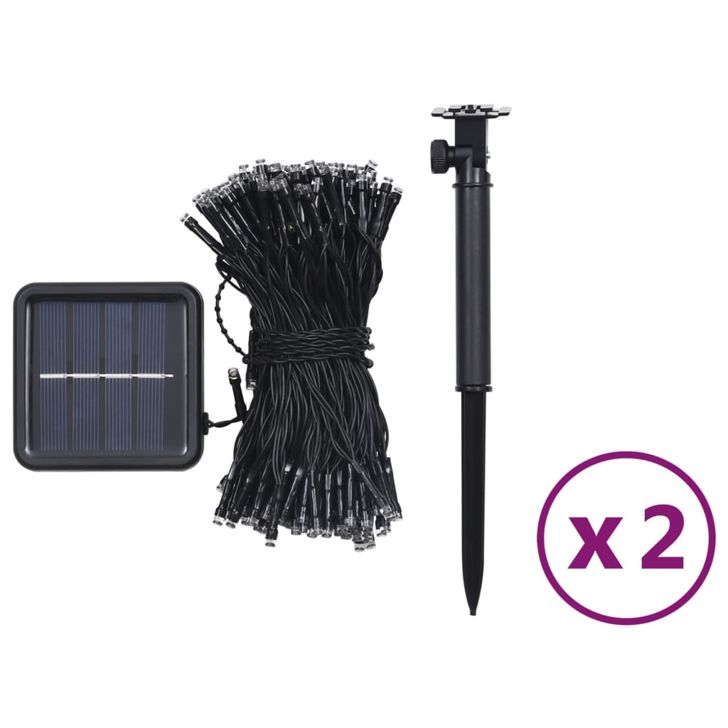 Two packs of solar fairy lights with a solar panel and ground stake.