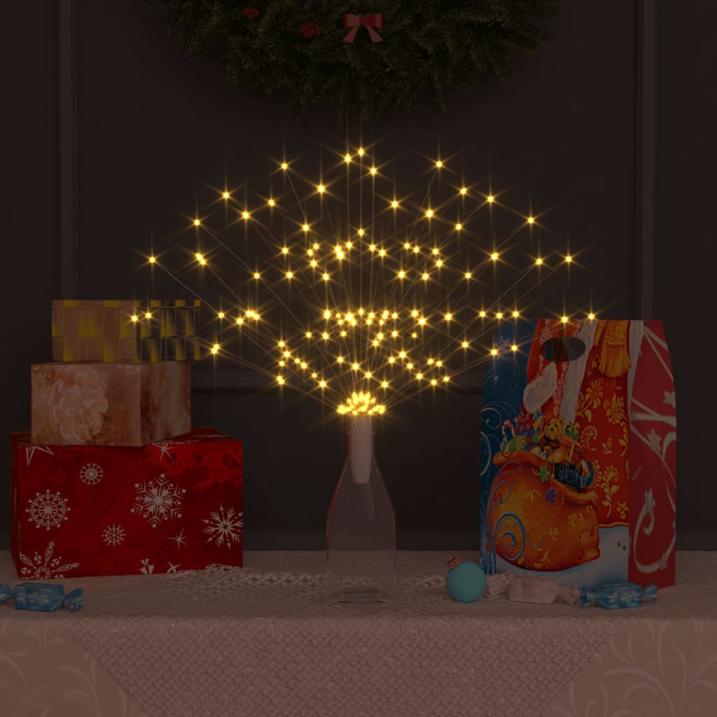 Warm white LED firework lights on flexible copper strings for festive decor.