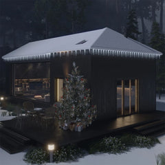 Icicle LED Christmas lights with 100 cold white acrylic bulbs on a snowy cabin roof.