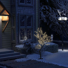 A 4ft cherry blossom Christmas tree with 128 warm white LEDs, lit in a snowy outdoor setting.