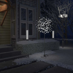 A 6 ft cherry blossom Christmas tree with 200 cold white LEDs stands in a snowy outdoor scene at night.