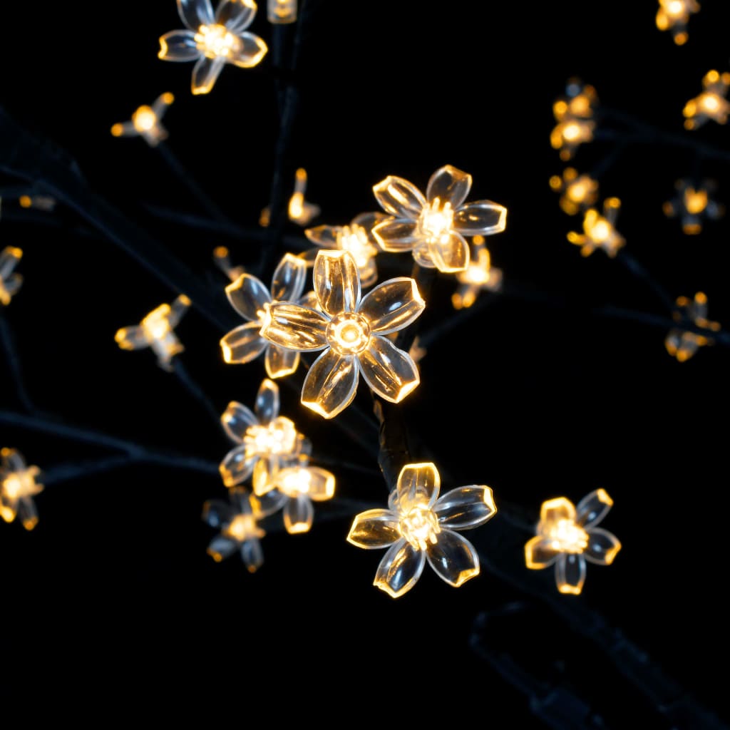 A 7ft cherry blossom Christmas tree with 220 warm white LED lights and a sturdy metal base.