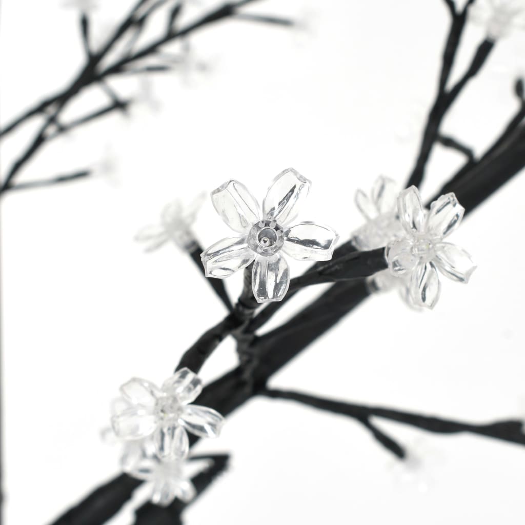 7ft LED Cherry Blossom Christmas tree with cold white lights and flexible plastic blossoms.
