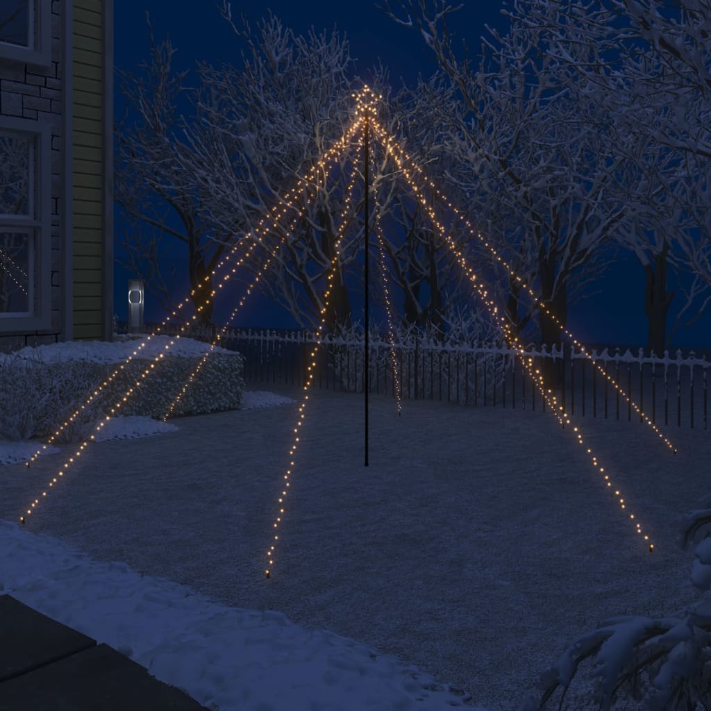 A 12ft pre-lit LED Christmas tree with 576 warm white lights in a waterfall design for indoor or outdoor use.