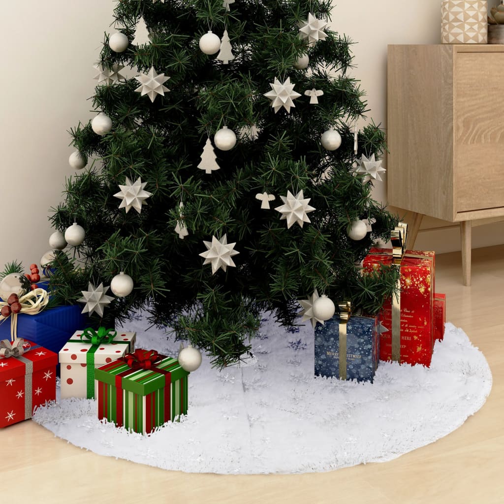White faux fur Christmas tree skirt with snowflake embroidery, 48 inches diameter.