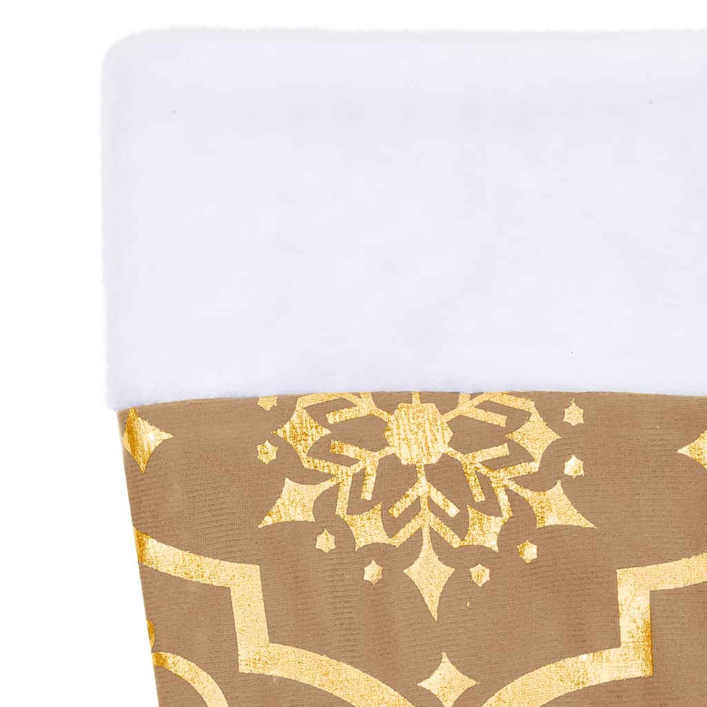 Yellow polyester Christmas tree skirt with snowflake pattern and matching sock, 5 ft diameter.