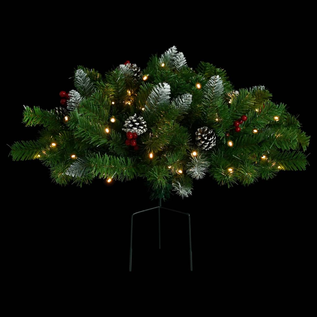 A 15.7-inch pre-lit artificial PVC Christmas pathway tree in green with LED lights, red berries, and pinecones on a steel spike.