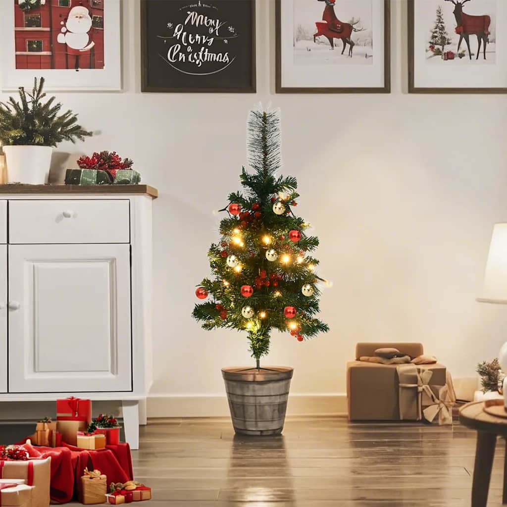 Two 29.9-inch pre-lit artificial green PVC Christmas trees with berries, cones, and ornaments.