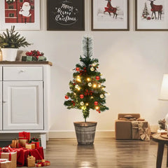 Two 29.9-inch pre-lit artificial green PVC Christmas trees with berries, cones, and ornaments.