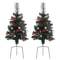 Two 29.9-inch pre-lit green PVC Christmas trees with red berries, gold balls, and metal stands.