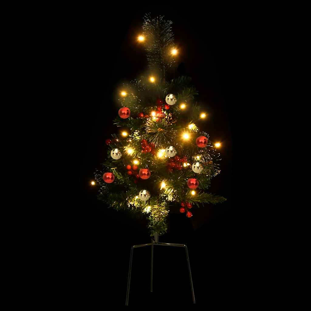 Two 29.9-inch pre-lit artificial green PVC Christmas trees with red berries, cones, balls, and warm LED lights on steel stands.