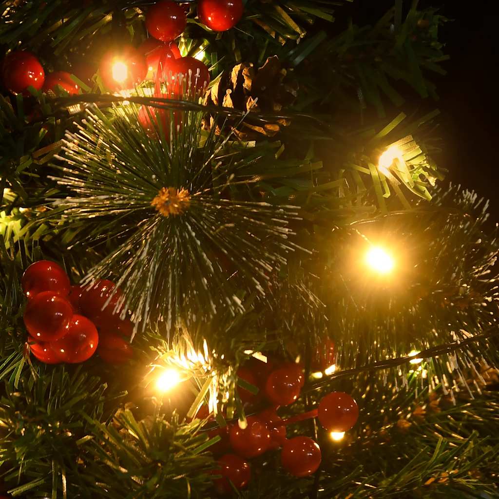 Two 29.9-inch pre-lit artificial PVC Christmas trees with green branches, red berries, pine cones, and warm LED lights.