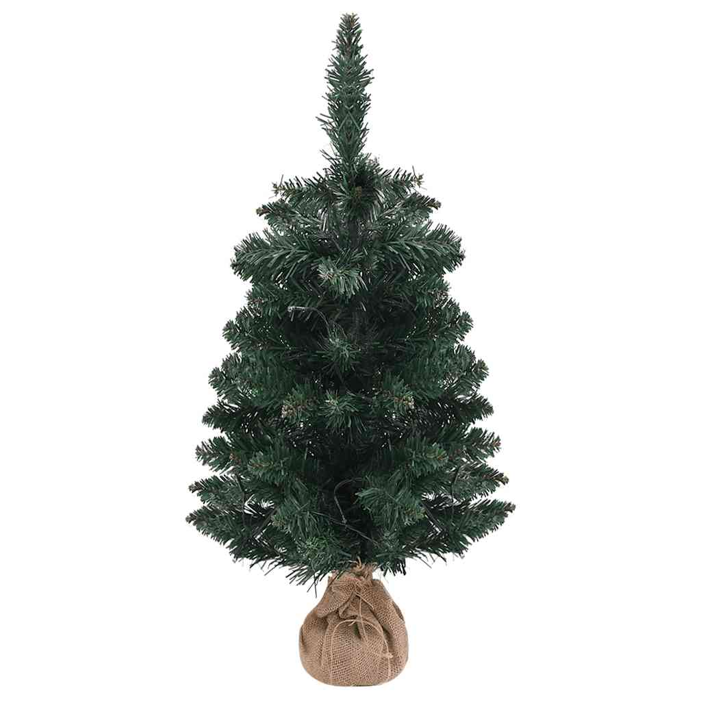 A 3 ft pre-lit artificial Christmas tree in green PVC with burlap base.