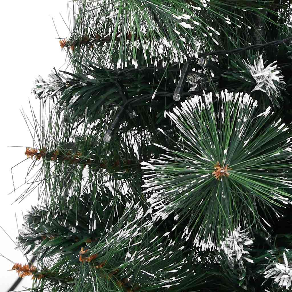 A 2 ft pre-lit artificial Christmas tree with green PVC branches and snow flocking.