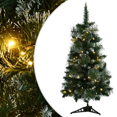 A 3 ft pre-lit artificial Christmas tree with green PVC branches, flocked snow, and warm LED lights on a steel stand.