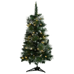 A 3 ft pre-lit artificial Christmas tree with green PVC needles and snow.