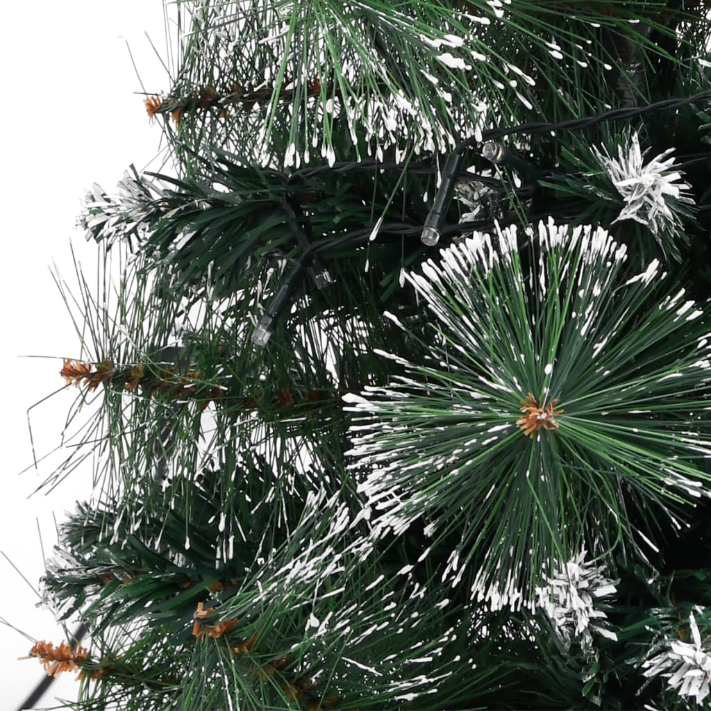 A 3 ft pre-lit artificial Christmas tree with green PVC branches, flocked snow, and warm LED lights.