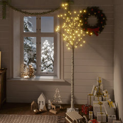 6ft warm white willow LED Christmas tree with 200 LEDs in a cozy holiday room.