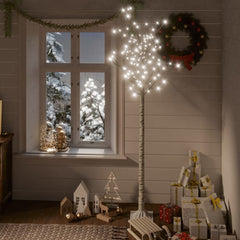 6ft willow Christmas tree with 200 cold white LEDs in a cozy snowy room.