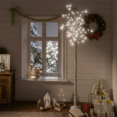 A 7ft LED willow Christmas tree with 220 cold white lights in a cozy holiday room.