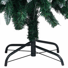 Close-up of the Bostome artificial Christmas tree with snow tips and gold ball ornaments on a metal stand.