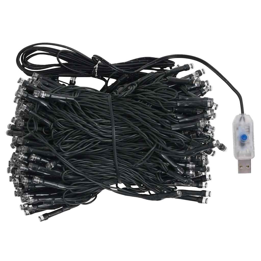 A 94.5-inch pre-lit artificial Christmas tree with snow tips, warm white LEDs, and gold balls on dense PVC branches.