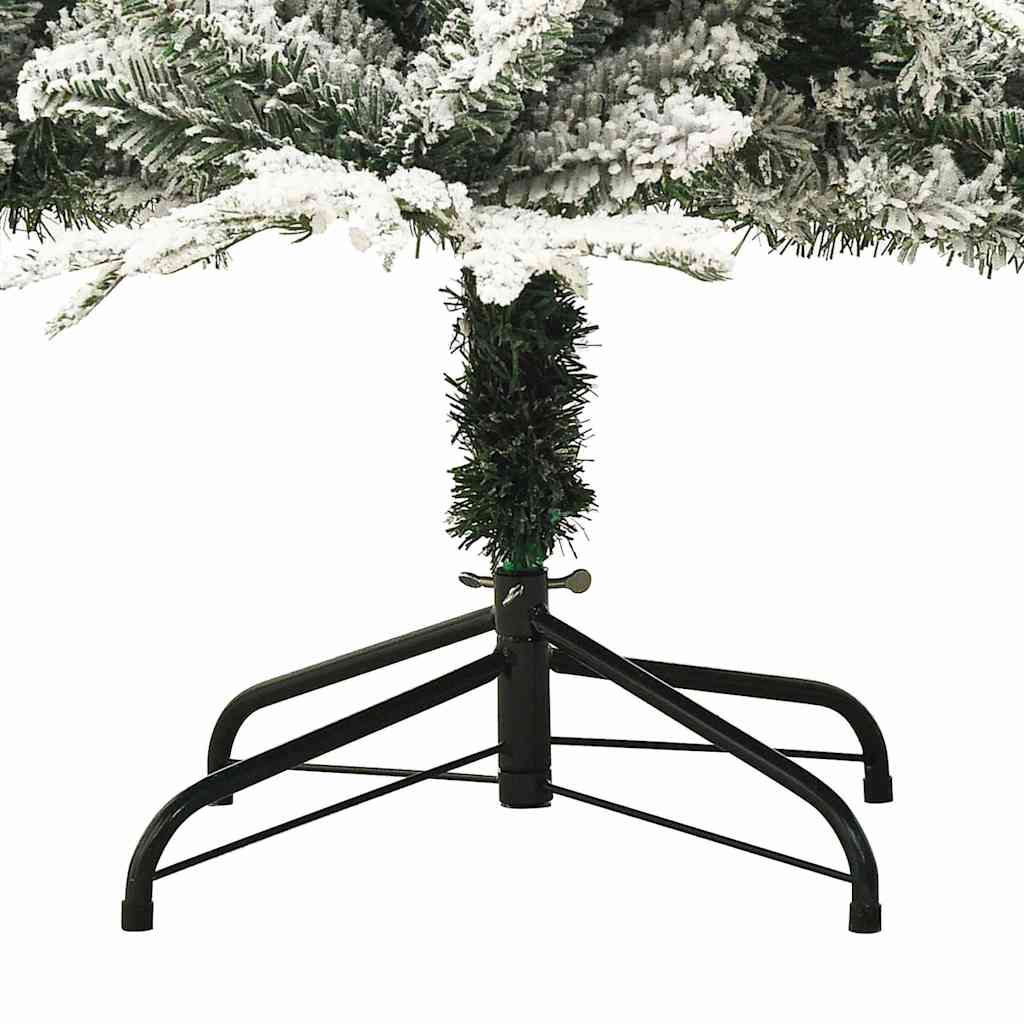 Close-up of the black metal stand supporting a flocked snow artificial Christmas tree.