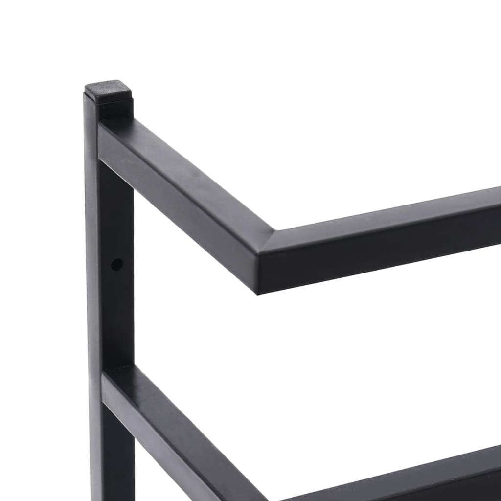Close-up of a black steel towel rack with a square top cap.