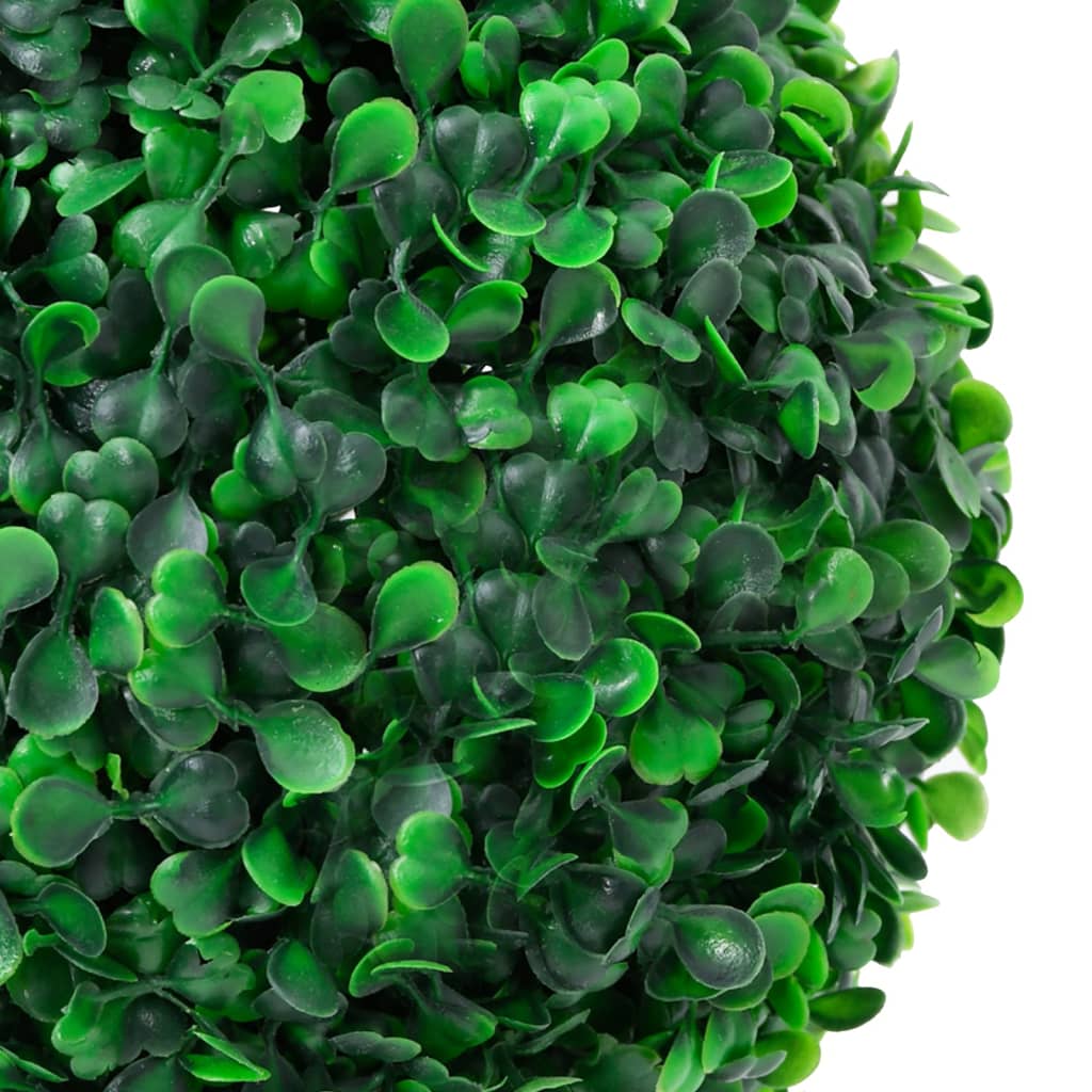 Close-up of a dense, artificial green boxwood plant with small, rounded leaves.