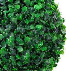 Close-up of a dense, artificial green boxwood plant with small, rounded leaves.
