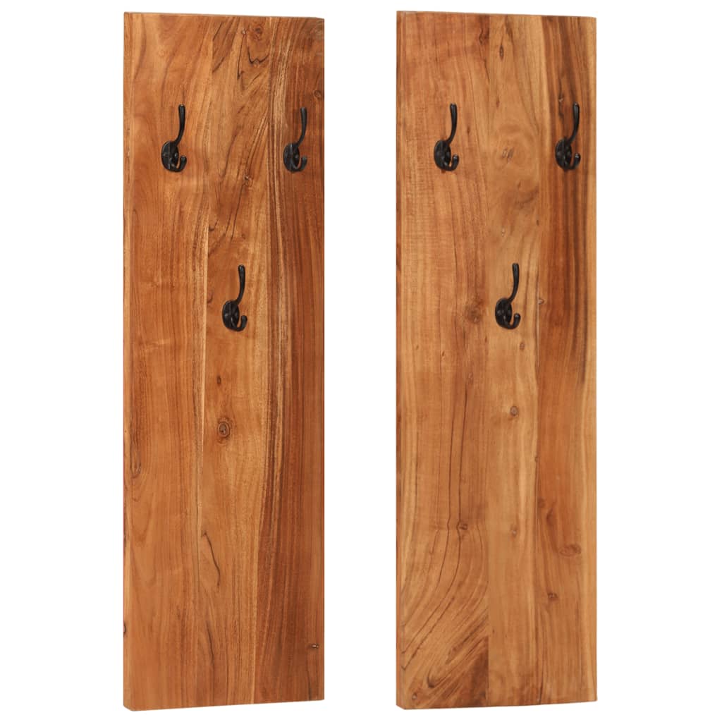 Set of two solid acacia wood wall-mounted coat racks, each with three black hooks.