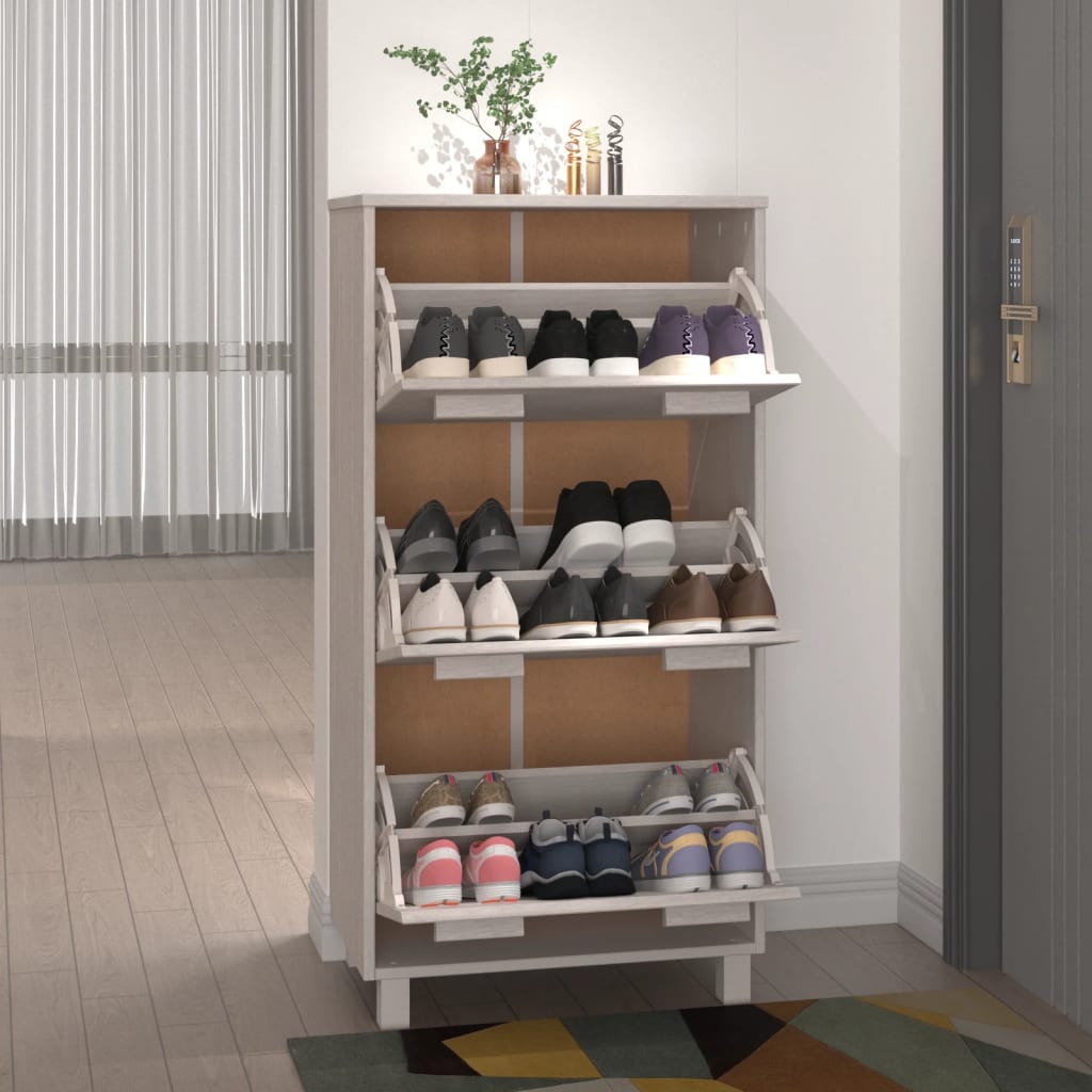 White solid pine wood shoe cabinet with three flip-drawers and warm wooden handles.