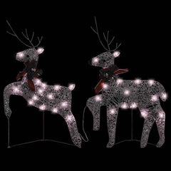 Pair of gold light-up Christmas reindeer with 40 warm white LEDs and red bows.