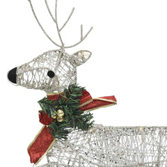 Pair of gold wireframe reindeer with warm white LEDs and red bows.